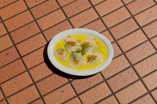 white fish crudo with pickled shallot & fennel