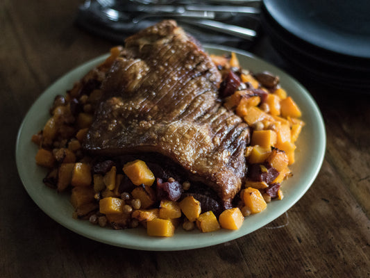 slow roasted pork shoulder with roasted pumpkin & chickpeas