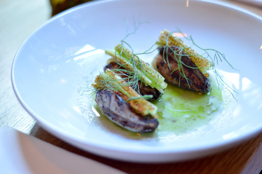 charcoal-grilled squid with black olive oil & cucumber