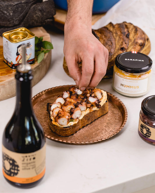 slow-cooked octopus & hummus on toasted olive bread