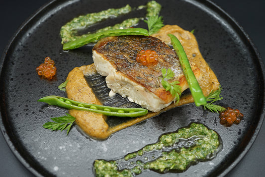 confit barramundi with tarragon gremolata, pumpkin & caviar