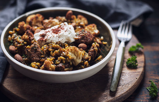 roast cauliflower & pork sausage freekeh pilaf