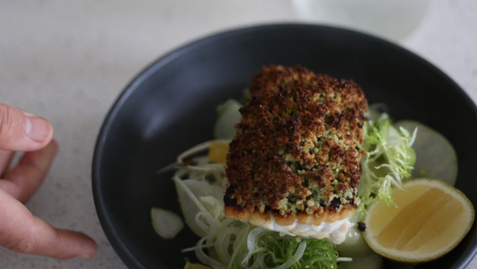 macadamia & quinoa-crusted barramundi with fennel, apple & citrus salad