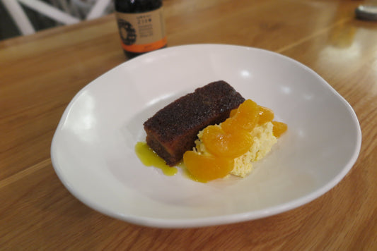 orange malva pudding with clotted cream and mandarin