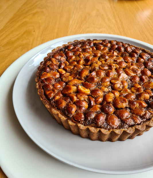 golden macadamia tart with extra virgin olive oil pastry