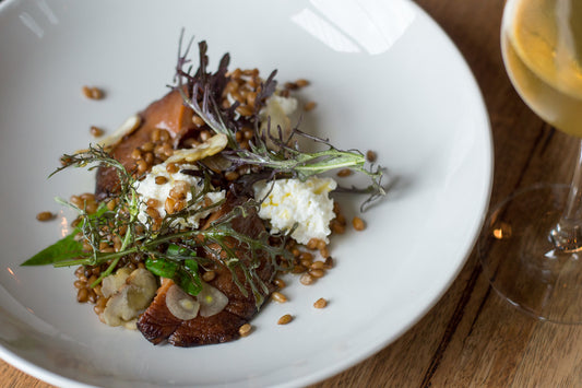 sautéed pine mushrooms, pickled rye grains & goat curd