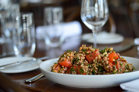 chopped tomato, barley, almond & sumac salad