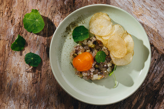 smoked barramundi tartare with smoked extra virgin olive oil, slow-cooked yolk and bay crisps