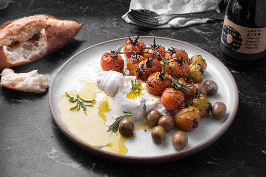 grilled tomatoes with burrata, olives, rosemary & olive oil